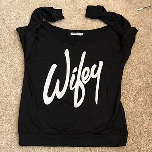Black wifey sweatshirt. Has a long neck to be worn off the shoulder.